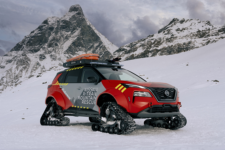 Nissan X-Trail Mountain Rescue on Snowy mountains facing right